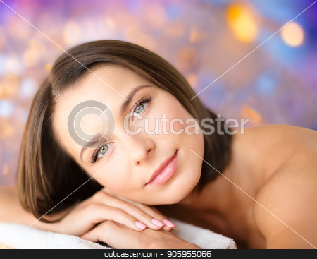 To use this stock image in your creative project, please select the size you need over to the right and click the "Add to Cart" button.
Your downloaded image will come with the Cutcaster watermark removed so don’t worry about the watermark you see on this page. close up of beautiful woman at spa stock photo, wellness and beauty concept - close up of beautiful woman at spa over holidays lights background by Syda Productions