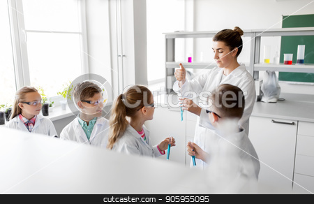 To use this stock image in your creative project, please select the size you need over to the right and click the "Add to Cart" button.
Your downloaded image will come with the Cutcaster watermark removed so don’t worry about the watermark you see on this page. teacher and students studying chemistry at school stock photo, education, science and children concept - teacher and kids or students with test tubes studying chemistry at school laboratory by Syda Productions