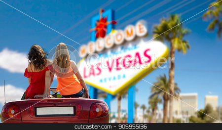 To use this stock image in your creative project, please select the size you need over to the right and click the "Add to Cart" button.
Your downloaded image will come with the Cutcaster watermark removed so don’t worry about the watermark you see on this page. friends driving in convertible car at las vegas stock photo, summer holidays, road trip and travel concept - happy friends driving in convertible car over welcome to fabulous las vegas sign background by Syda Productions