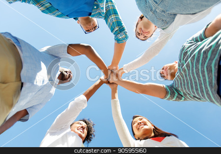 To use this stock image in your creative project, please select the size you need over to the right and click the "Add to Cart" button.
Your downloaded image will come with the Cutcaster watermark removed so don’t worry about the watermark you see on this page. happy smiling friends outdoors standing in circle stock photo, people, friendship and international concept - group of happy smiling friends outdoors standing in circle by Syda Productions