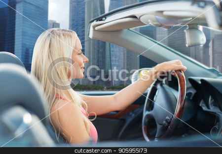 To use this stock image in your creative project, please select the size you need over to the right and click the "Add to Cart" button.
Your downloaded image will come with the Cutcaster watermark removed so don’t worry about the watermark you see on this page. woman driving convertible car over singapore city stock photo, travel, road trip and people concept - happy young woman driving convertible car over singapore city skyscrapers background by Syda Productions