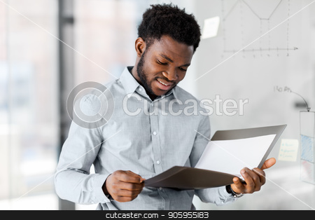 To use this stock image in your creative project, please select the size you need over to the right and click the "Add to Cart" button.
Your downloaded image will come with the Cutcaster watermark removed so don’t worry about the watermark you see on this page. african american businessman with folder at office stock photo, business, people and corporate concept - african american businessman with folder at office by Syda Productions