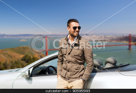 To use this stock image in your creative project, please select the size you need over to the right and click the "Add to Cart" button.
Your downloaded image will come with the Cutcaster watermark removed so don’t worry about the watermark you see on this page. happy man near convertible car outdoors stock photo, road trip, travel and people concept - happy man near convertible car over golden gate bridge in san francisco bay background by Syda Productions