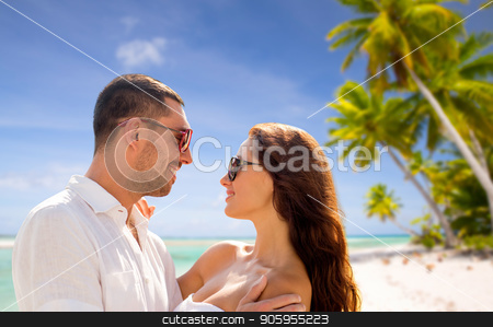 To use this stock image in your creative project, please select the size you need over to the right and click the "Add to Cart" button.
Your downloaded image will come with the Cutcaster watermark removed so don’t worry about the watermark you see on this page. happy couple in sunglasses over tropical beach stock photo, travel, tourism and summer vacation concept - happy smiling couple in sunglasses hugging over tropical beach background in french polynesia by Syda Productions