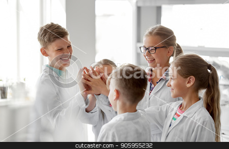 To use this stock image in your creative project, please select the size you need over to the right and click the "Add to Cart" button.
Your downloaded image will come with the Cutcaster watermark removed so don’t worry about the watermark you see on this page. happy kids making high five at school laboratory stock photo, education, science and children concept - happy kids making high five at school laboratory by Syda Productions