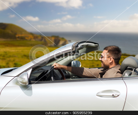 To use this stock image in your creative project, please select the size you need over to the right and click the "Add to Cart" button.
Your downloaded image will come with the Cutcaster watermark removed so don’t worry about the watermark you see on this page. happy man driving convertible car stock photo, road trip, travel and people concept - happy man driving convertible car over big sur coast of california background by Syda Productions
