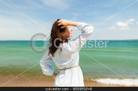 To use this stock image in your creative project, please select the size you need over to the right and click the "Add to Cart" button.
Your downloaded image will come with the Cutcaster watermark removed so don’t worry about the watermark you see on this page. happy smiling woman on summer beach stock photo, people and leisure concept - happy smiling woman on summer beach by Syda Productions
