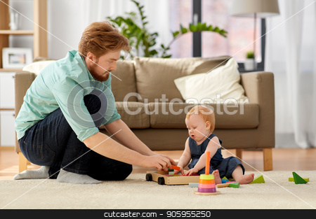To use this stock image in your creative project, please select the size you need over to the right and click the "Add to Cart" button.
Your downloaded image will come with the Cutcaster watermark removed so don’t worry about the watermark you see on this page. father and baby playing with toy blocks at home stock photo, family, fatherhood and people concept - happy red haired father and little baby daughter playing with toy blocks kit at home by Syda Productions
