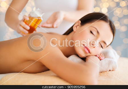To use this stock image in your creative project, please select the size you need over to the right and click the "Add to Cart" button.
Your downloaded image will come with the Cutcaster watermark removed so don’t worry about the watermark you see on this page. close up of beautiful woman having massage at spa stock photo, wellness, spa and beauty concept - close up of beautiful woman having massage over holidays lights background by Syda Productions