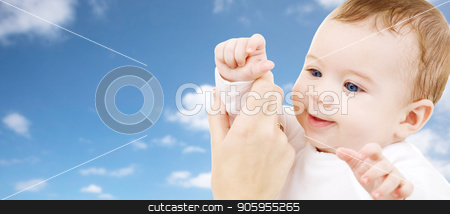 To use this stock image in your creative project, please select the size you need over to the right and click the "Add to Cart" button.
Your downloaded image will come with the Cutcaster watermark removed so don’t worry about the watermark you see on this page. close up of sweet little baby with mother hand stock photo, family, childhood and people concept - close up of sweet little baby with mother hand over sky background by Syda Productions