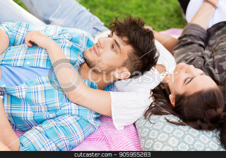 To use this stock image in your creative project, please select the size you need over to the right and click the "Add to Cart" button.
Your downloaded image will come with the Cutcaster watermark removed so don’t worry about the watermark you see on this page. happy friends chilling on picnic blanket at summer stock photo, friendship, leisure and summer concept - group of happy friends chilling on picnic blanket at park by Syda Productions