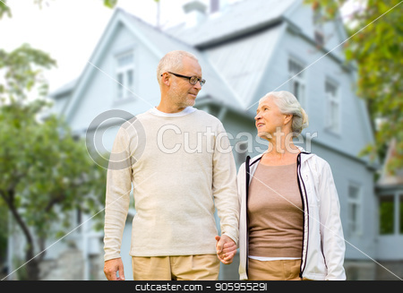 To use this stock image in your creative project, please select the size you need over to the right and click the "Add to Cart" button.
Your downloaded image will come with the Cutcaster watermark removed so don’t worry about the watermark you see on this page. happy senior couple holding hands over house stock photo, old age, accommodation and real estate concept - happy senior couple holding hands over living house background by Syda Productions