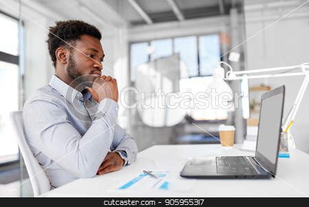 To use this stock image in your creative project, please select the size you need over to the right and click the "Add to Cart" button.
Your downloaded image will come with the Cutcaster watermark removed so don’t worry about the watermark you see on this page. african american businessman with laptop at office stock photo, business, people and technology concept - african american businessman with laptop computer working at office by Syda Productions