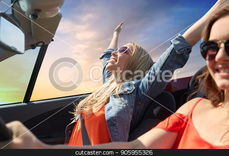 To use this stock image in your creative project, please select the size you need over to the right and click the "Add to Cart" button.
Your downloaded image will come with the Cutcaster watermark removed so don’t worry about the watermark you see on this page. happy young women driving in convertible car stock photo, summer holidays, road trip, vacation, travel and people concept - happy young women driving in convertible car and laughing over sky background by Syda Productions