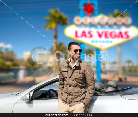 To use this stock image in your creative project, please select the size you need over to the right and click the "Add to Cart" button.
Your downloaded image will come with the Cutcaster watermark removed so don’t worry about the watermark you see on this page. happy man near convertible car at las vegas stock photo, road trip, travel and people concept - happy man near convertible car over welcome to fabulous las vegas sign background by Syda Productions