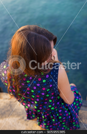 To use this stock image in your creative project, please select the size you need over to the right and click the "Add to Cart" button.
Your downloaded image will come with the Cutcaster watermark removed so don’t worry about the watermark you see on this page. The girl in a beautiful dress is sitting on the pier. stock photo, The girl in a beautiful dress is sitting on the pier by Sergiy Artsaba