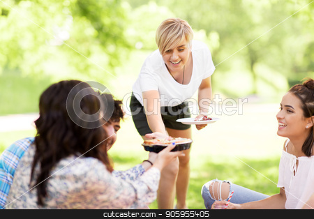 To use this stock image in your creative project, please select the size you need over to the right and click the "Add to Cart" button.
Your downloaded image will come with the Cutcaster watermark removed so don’t worry about the watermark you see on this page. happy friends sharing pie at picnic in summer park stock photo, friendship, leisure and food concept - group of happy friends sharing pie at picnic in summer park by Syda Productions
