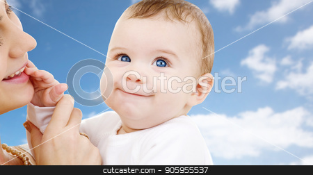To use this stock image in your creative project, please select the size you need over to the right and click the "Add to Cart" button.
Your downloaded image will come with the Cutcaster watermark removed so don’t worry about the watermark you see on this page. mother with baby over sky background stock photo, family and motherhood concept - happy smiling young mother with little baby over sky background by Syda Productions