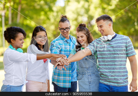 To use this stock image in your creative project, please select the size you need over to the right and click the "Add to Cart" button.
Your downloaded image will come with the Cutcaster watermark removed so don’t worry about the watermark you see on this page. happy friends stacking hands in park stock photo, unity, friendship and international concept - group of happy smiling friends stacking hands in park by Syda Productions