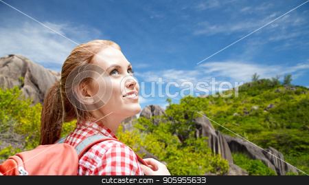 To use this stock image in your creative project, please select the size you need over to the right and click the "Add to Cart" button.
Your downloaded image will come with the Cutcaster watermark removed so don’t worry about the watermark you see on this page. happy woman with backpack over seychelles island stock photo, adventure, travel, tourism, hike and people concept - smiling young woman with backpack over background of seychelles island by Syda Productions