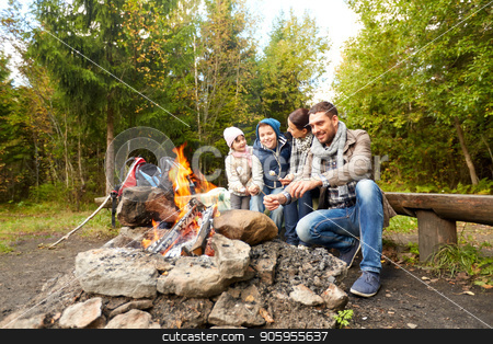 To use this stock image in your creative project, please select the size you need over to the right and click the "Add to Cart" button.
Your downloaded image will come with the Cutcaster watermark removed so don’t worry about the watermark you see on this page. happy family roasting marshmallow over campfire stock photo, camping, travel, tourism, hike and people concept - happy family roasting marshmallow over campfire by Syda Productions