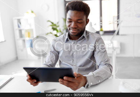 To use this stock image in your creative project, please select the size you need over to the right and click the "Add to Cart" button.
Your downloaded image will come with the Cutcaster watermark removed so don’t worry about the watermark you see on this page. african businessman with tablet pc at office stock photo, business, people and technology concept - african american businessman with tablet pc computer at office by Syda Productions