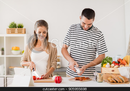 To use this stock image in your creative project, please select the size you need over to the right and click the "Add to Cart" button.
Your downloaded image will come with the Cutcaster watermark removed so don’t worry about the watermark you see on this page. happy couple cooking food at home kitchen stock photo, people and healthy eating concept - happy couple cooking food at home kitchen by Syda Productions