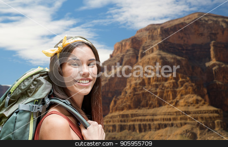 To use this stock image in your creative project, please select the size you need over to the right and click the "Add to Cart" button.
Your downloaded image will come with the Cutcaster watermark removed so don’t worry about the watermark you see on this page. happy woman with backpack over grand canyon stock photo, adventure, travel, tourism, hike and people concept - smiling young woman with backpack over grand canyon national park background by Syda Productions