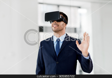 To use this stock image in your creative project, please select the size you need over to the right and click the "Add to Cart" button.
Your downloaded image will come with the Cutcaster watermark removed so don’t worry about the watermark you see on this page. businessman with virtual reality headset at office stock photo, business, technology and augmented reality concept - businessman with vr headset at office by Syda Productions
