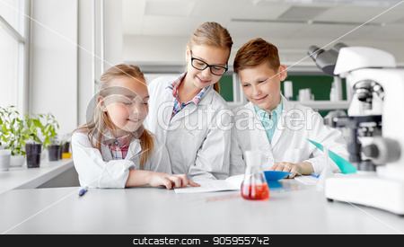 To use this stock image in your creative project, please select the size you need over to the right and click the "Add to Cart" button.
Your downloaded image will come with the Cutcaster watermark removed so don’t worry about the watermark you see on this page. kids studying chemistry at school laboratory stock photo, education, science and children concept - happy kids with workbooks studying chemistry at school laboratory by Syda Productions