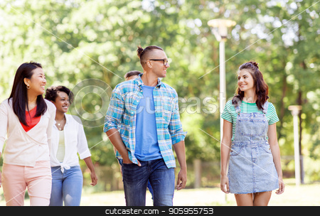 To use this stock image in your creative project, please select the size you need over to the right and click the "Add to Cart" button.
Your downloaded image will come with the Cutcaster watermark removed so don’t worry about the watermark you see on this page. group of happy international friends in park stock photo, people, friendship and international concept - group of happy friends walking in park by Syda Productions