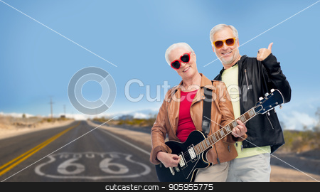 To use this stock image in your creative project, please select the size you need over to the right and click the "Add to Cart" button.
Your downloaded image will come with the Cutcaster watermark removed so don’t worry about the watermark you see on this page. senior couple with guitar over route 66 stock photo, rock music, old age and travel concept - happy senior couple with electric guitar over us route 66 background showing thumbs up by Syda Productions