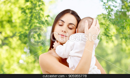 To use this stock image in your creative project, please select the size you need over to the right and click the "Add to Cart" button.
Your downloaded image will come with the Cutcaster watermark removed so don’t worry about the watermark you see on this page. mother with baby over green natural background stock photo, family and motherhood concept - happy smiling young mother with little baby over green natural background by Syda Productions