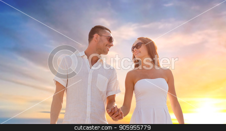 To use this stock image in your creative project, please select the size you need over to the right and click the "Add to Cart" button.
Your downloaded image will come with the Cutcaster watermark removed so don’t worry about the watermark you see on this page. happy couple holding hands over sunset sky stock photo, love, summer and relationships concept - happy couple on vacation wearing sunglasses walking and holding hands over sunset sky background by Syda Productions