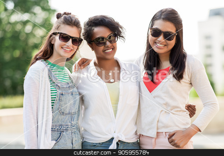 To use this stock image in your creative project, please select the size you need over to the right and click the "Add to Cart" button.
Your downloaded image will come with the Cutcaster watermark removed so don’t worry about the watermark you see on this page. happy young women in sunglasses outdoors stock photo, female friendship, summer and eyewear - happy young women in sunglasses outdoors by Syda Productions