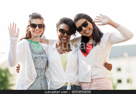 To use this stock image in your creative project, please select the size you need over to the right and click the "Add to Cart" button.
Your downloaded image will come with the Cutcaster watermark removed so don’t worry about the watermark you see on this page. happy young women in sunglasses outdoors stock photo, female friendship, summer and eyewear - happy young women in sunglasses outdoors waving hands by Syda Productions