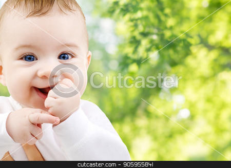 To use this stock image in your creative project, please select the size you need over to the right and click the "Add to Cart" button.
Your downloaded image will come with the Cutcaster watermark removed so don’t worry about the watermark you see on this page. close up of sweet little baby stock photo, childhood and people concept - close up of sweet little baby over green natural background by Syda Productions