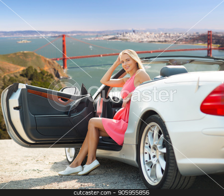 To use this stock image in your creative project, please select the size you need over to the right and click the "Add to Cart" button.
Your downloaded image will come with the Cutcaster watermark removed so don’t worry about the watermark you see on this page. woman in convertible car over golden gate bridge stock photo, travel, road trip and people concept - happy young woman posing in convertible car over golden gate bridge in san francisco bay background by Syda Productions