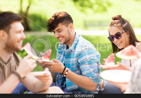 To use this stock image in your creative project, please select the size you need over to the right and click the "Add to Cart" button.
Your downloaded image will come with the Cutcaster watermark removed so don’t worry about the watermark you see on this page. happy friends eating watermelon at summer picnic stock photo, friendship, leisure and summer concept - group of happy friends eating watermelon at picnic in park by Syda Productions