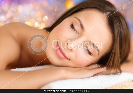 To use this stock image in your creative project, please select the size you need over to the right and click the "Add to Cart" button.
Your downloaded image will come with the Cutcaster watermark removed so don’t worry about the watermark you see on this page. close up of beautiful woman at spa stock photo, wellness and beauty concept - close up of beautiful woman at spa over holidays lights background by Syda Productions