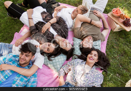 To use this stock image in your creative project, please select the size you need over to the right and click the "Add to Cart" button.
Your downloaded image will come with the Cutcaster watermark removed so don’t worry about the watermark you see on this page. happy friends chilling on picnic blanket at summer stock photo, friendship, leisure and summer concept - group of happy friends chilling on picnic blanket at park by Syda Productions