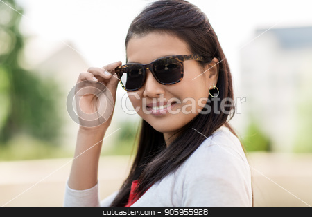 To use this stock image in your creative project, please select the size you need over to the right and click the "Add to Cart" button.
Your downloaded image will come with the Cutcaster watermark removed so don’t worry about the watermark you see on this page. portrait of young woman in sunglasses outdoors stock photo, summer, eyewear and people concept - portrait of happy smiling young woman in sunglasses outdoors by Syda Productions