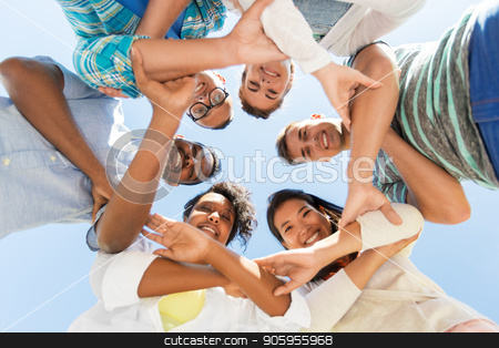 To use this stock image in your creative project, please select the size you need over to the right and click the "Add to Cart" button.
Your downloaded image will come with the Cutcaster watermark removed so don’t worry about the watermark you see on this page. happy smiling friends outdoors standing in circle stock photo, people, friendship and international concept - group of happy smiling friends outdoors standing in circle by Syda Productions