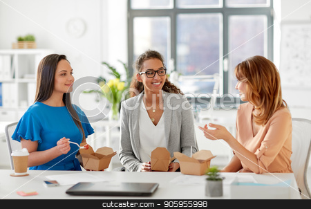 To use this stock image in your creative project, please select the size you need over to the right and click the "Add to Cart" button.
Your downloaded image will come with the Cutcaster watermark removed so don’t worry about the watermark you see on this page. happy businesswomen eating take out food at office stock photo, business lunch and people concept - happy businesswomen eating take out food and talking at office by Syda Productions