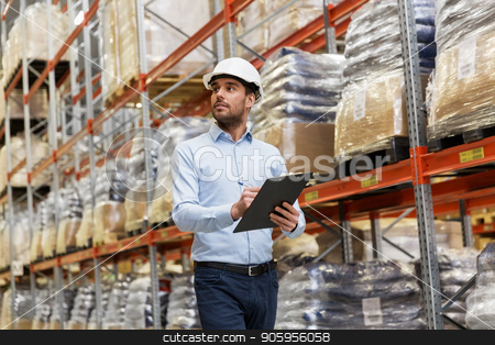 To use this stock image in your creative project, please select the size you need over to the right and click the "Add to Cart" button.
Your downloaded image will come with the Cutcaster watermark removed so don’t worry about the watermark you see on this page. businessman in helmet with clipboard at warehouse stock photo, logistic business, shipment and people concept - businessman in helmet with clipboard checking goods at warehouse by Syda Productions