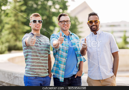 To use this stock image in your creative project, please select the size you need over to the right and click the "Add to Cart" button.
Your downloaded image will come with the Cutcaster watermark removed so don’t worry about the watermark you see on this page. happy young men in sunglasses showing thumbs up stock photo, male friendship, summer and eyewear - happy young men in sunglasses outdoors showing thumbs up by Syda Productions