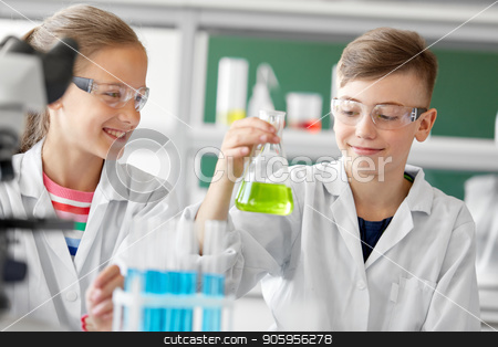 To use this stock image in your creative project, please select the size you need over to the right and click the "Add to Cart" button.
Your downloaded image will come with the Cutcaster watermark removed so don’t worry about the watermark you see on this page. kids with test tubes studying chemistry at school stock photo, education, science and children concept - kids with test tubes studying chemistry at school laboratory by Syda Productions