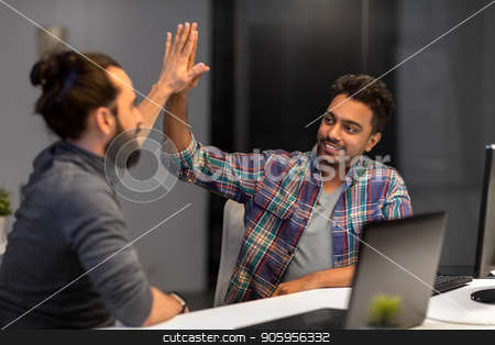 To use this stock image in your creative project, please select the size you need over to the right and click the "Add to Cart" button.
Your downloaded image will come with the Cutcaster watermark removed so don’t worry about the watermark you see on this page. creative team making high five at night office stock photo, deadline, teamwork and success concept - creative team with computers making high five at night office by Syda Productions
