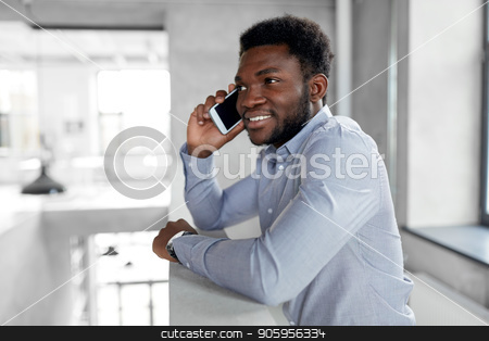 To use this stock image in your creative project, please select the size you need over to the right and click the "Add to Cart" button.
Your downloaded image will come with the Cutcaster watermark removed so don’t worry about the watermark you see on this page. businessman calling on smartphone at office stock photo, business, technology, communication and people concept - african american businessman calling on smartphone at office by Syda Productions