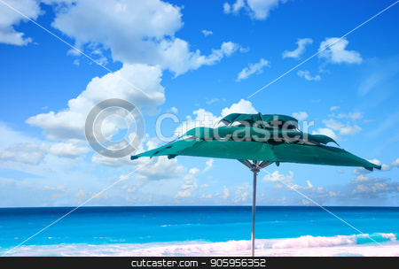 To use this stock image in your creative project, please select the size you need over to the right and click the "Add to Cart" button.
Your downloaded image will come with the Cutcaster watermark removed so don’t worry about the watermark you see on this page. Green Umbrella and Ocean stock photo, A green sun umbrella against a blue sky and ocean by Darryl Brooks